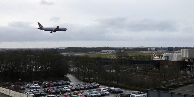 A plane comes in to land at Gatwick Airport in England, Friday, Dec. 21, 2018. (AP Photo/Kirsty Wigglesworth)