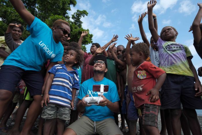 Crowds gather around to see the test flights of the new drone.