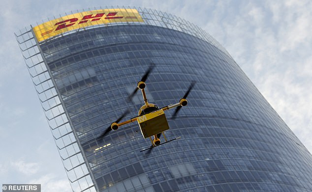 A prototype "parcelcopter" of German postal and logistics group Deutsche Post DHL flies in front of the company's headquarters in Bonn December 9, 2013. DHL on Monday showed its prototype "parcelcopter," which is a modified microdrone that costs 40,000 euros ($54,900)