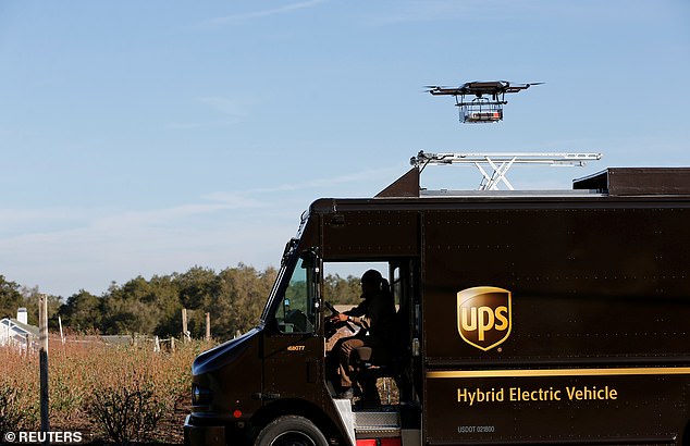 Above, a drone demonstrates delivery capabilities from the top of a UPS truck during testing in Lithia, Florida, U.S. February 20, 2017. File photo