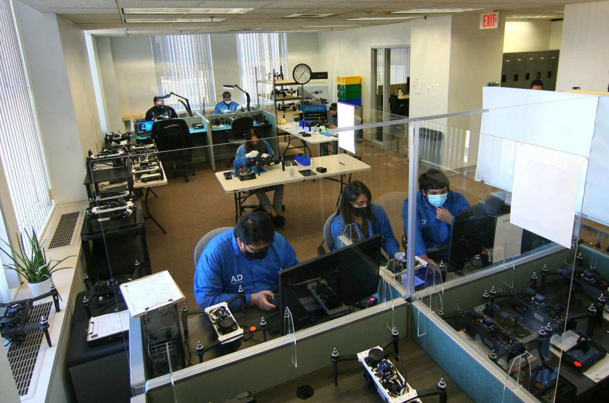 Aquiline Drones technicians work on drones in the company's headquarters at 750 Main St., in downtown Hartford, Conn., on Tuesday. March 30, 2021.