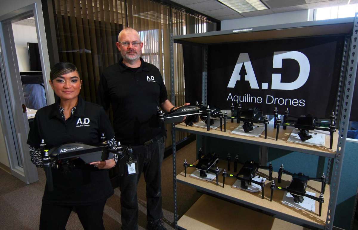 Aquiline Drones supervisor-lead technician Stephanie Hernandez and production supervisor Joseph Gates pose at the company's headquarters at 750 Main St., in downtown Hartford, Conn., on Tuesday March 30, 2021.