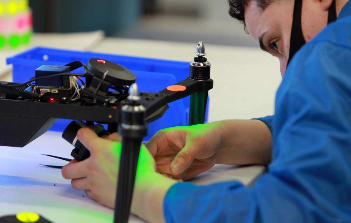 Aquiline Drones technician Brandon Figueroa assembles a drone at the company's headquarters at 750 Main St., in downtown Hartford, Conn., on Tuesday, March 30, 2021.
