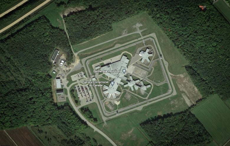 A bird's eye-view of the Donnacona maximum-security prison in Quebec. The prison sits among rural land. 