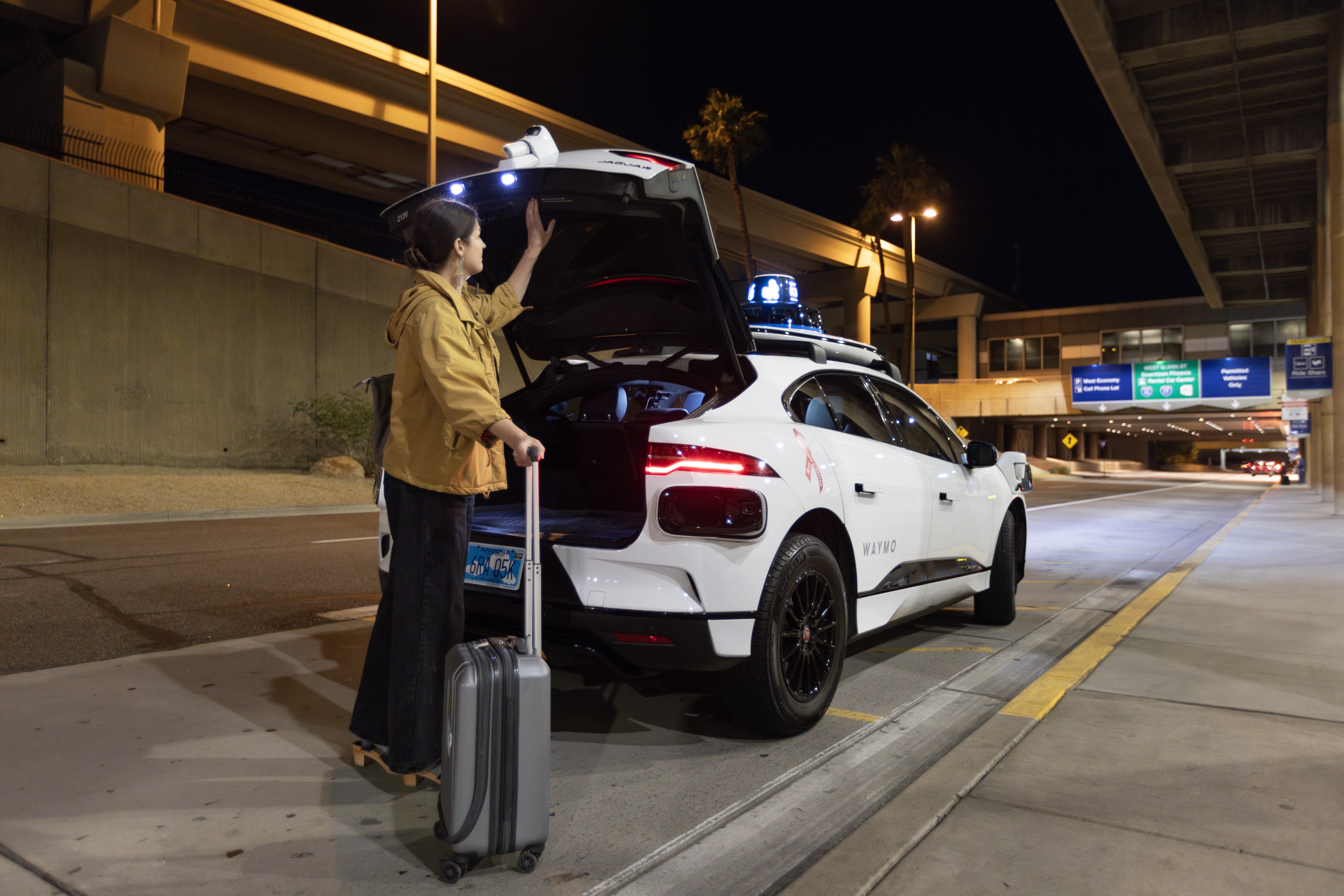 Waymo One robotaxi sky harbor terminal phoenix curbside pickup