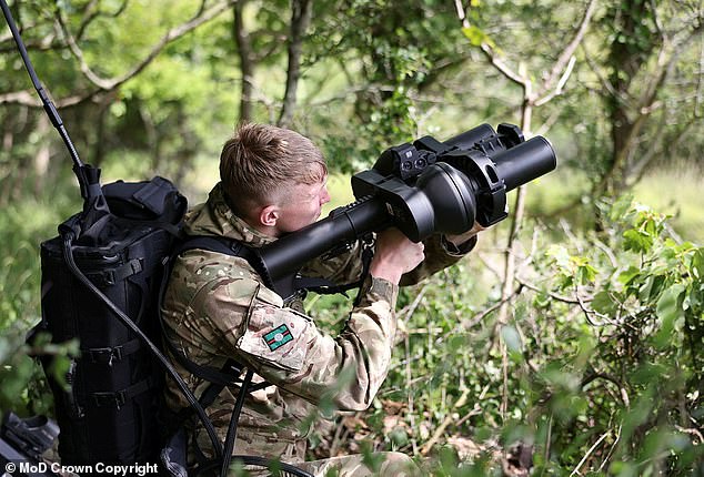 And other soldiers have tested new anti-drone guns like this NightFighter which uses technology to target and disrupt unmanned aerial vehicles (UAVs), rending them useless