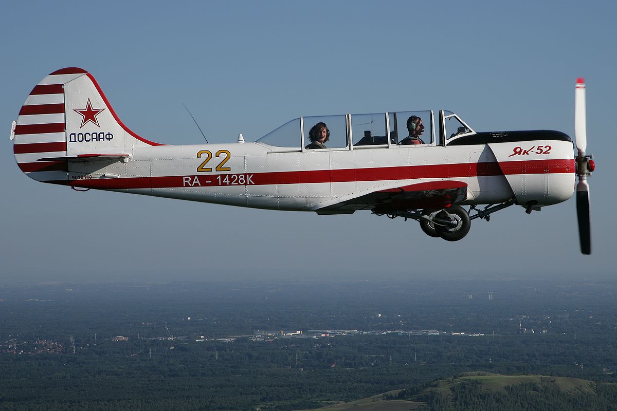 Yak 52 in flight