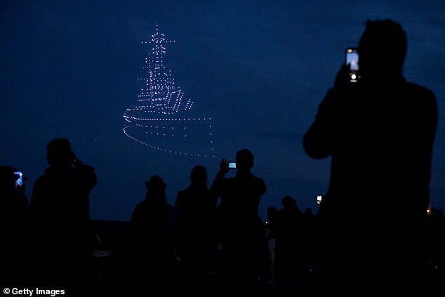 A D-Day themed drone display takes place above the Portsmouth Naval Memorial